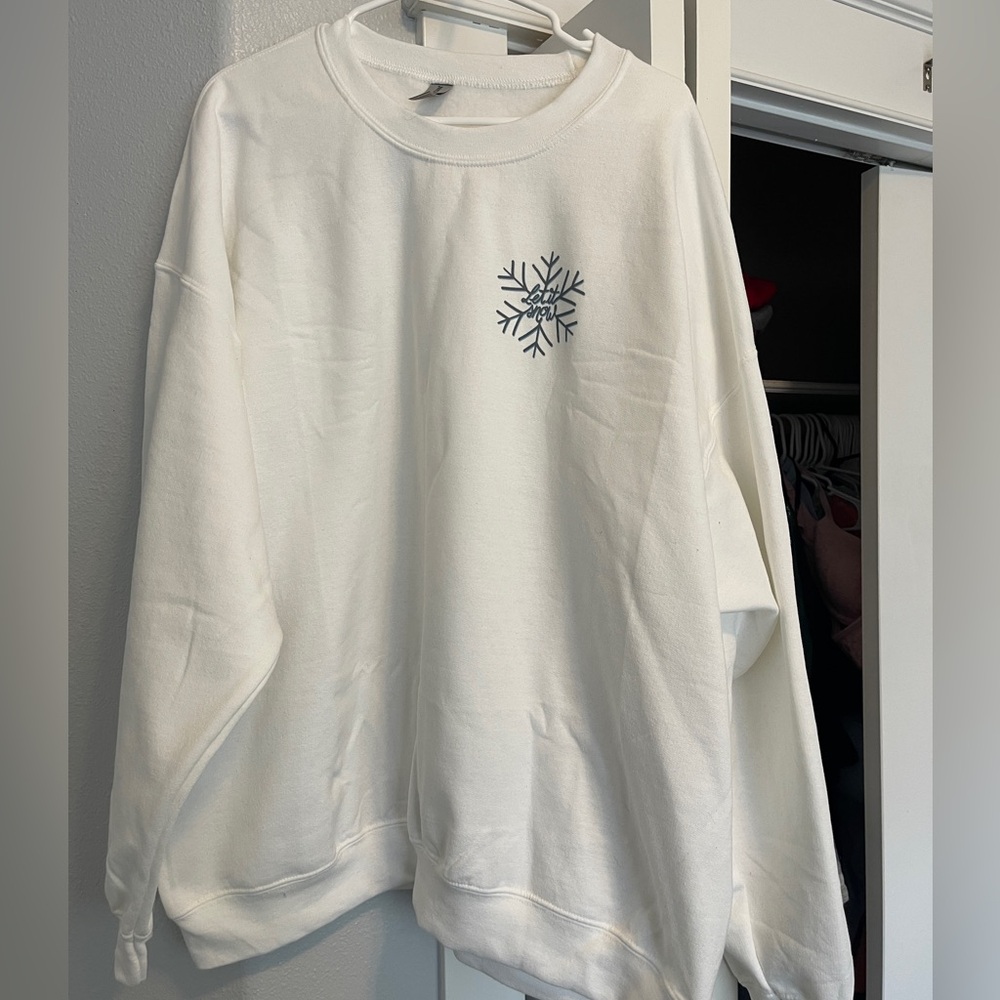 Brand new super cute “Let it snow” crewneck sweatshirt